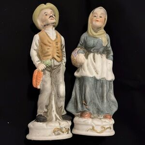 Deville man farmer and wife figurine.   Set of 2
